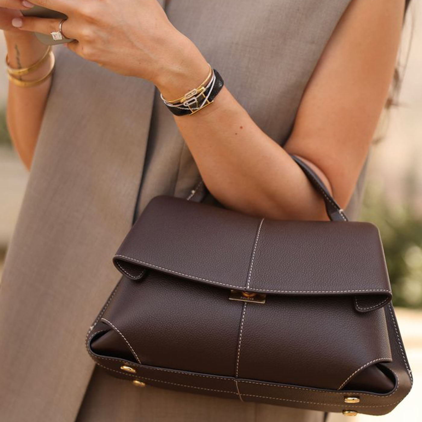 Women Wearing Evening Top Handle Bag